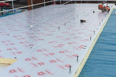 fit 120mm rigid insulation to a flat roof: